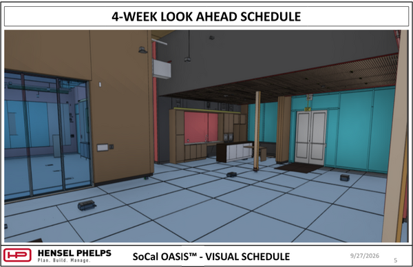Slide 5 of the Hensel Phelps visual schedule (September 27, 2026) displays a 3D architectural rendering for the SoCal OASIS™ project. The rendering presents an interior lobby view showing grid-tiled flooring, wood wall paneling, a glass partition on the left, a central reception desk with cabinetry, and white exit doors set into a blue accent wall.