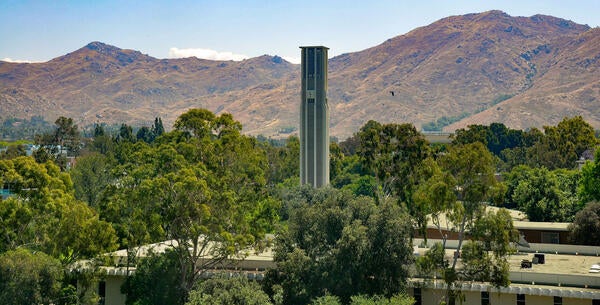 The bell tower and view of the Box Spring Mountain on May 29, 2019.  (UCR/Ethan Roesler)